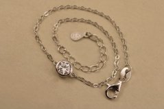 Náramok- číry zirkón v objímke- rhódiované striebro