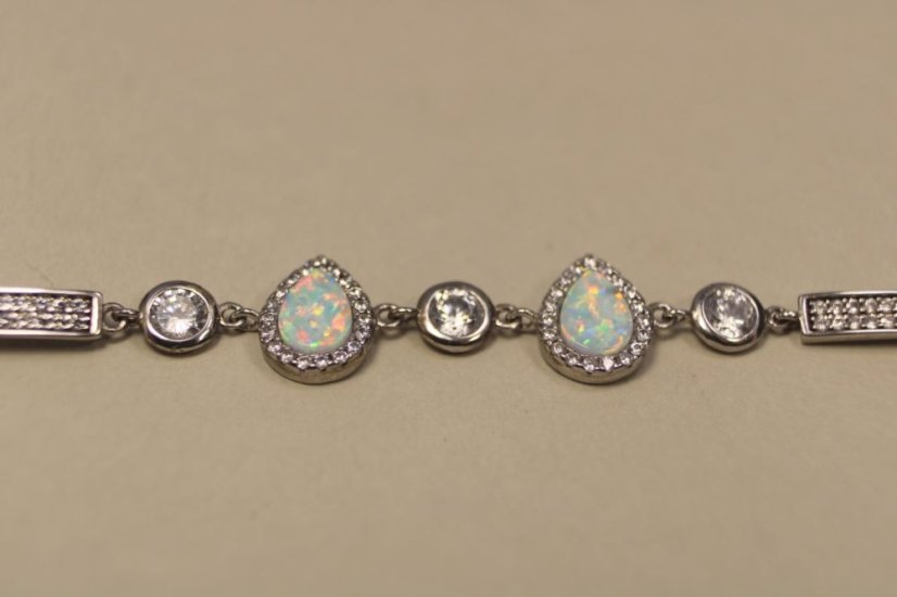 Strieborný náramok zdobený bielym opálom a čírymi zirkónmi, rhodium, 16-19,5 cm, 5,35g, 925/1000