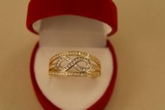 Prsteň- nekonečno- zirkóny- viacfarebné zlato- 14K