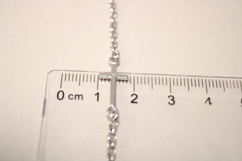 Retiazkový strieborný náramok s krížikom, rhódium, 18-21cm, 2,19g, 925/1000 - Materiál: Rhodiované striebro, Dĺžka náramku (cm): 18 + 3, Váha (g): 2,19, Rýdzosť: STRIEBRO 925/1000