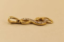 Zlatý prívesok husľový kľúč, žlté zlato a číre zirkóny, 0,78g 14k 585/1000