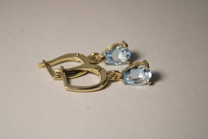 Zlaté náušnice so svetlo modrými topásmi, žlté zlato, francúzsky patent, 2,84 g, 14K 585/1000