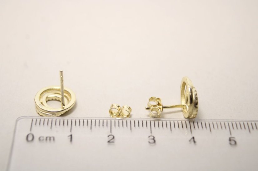Pozlátené strieborné náušnice v tvare prepojených kruhov s čírymi zirkónmi, napichovačky, 2,16 g, 925/1000