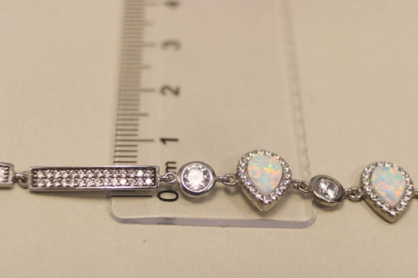 Strieborný náramok zdobený bielym opálom a čírymi zirkónmi, rhodium, 16-19,5 cm, 5,35g, 925/1000