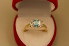 Prsteň- žlté zlato-svetlo modrý zirkón-2x číry zirkón-14 karátov