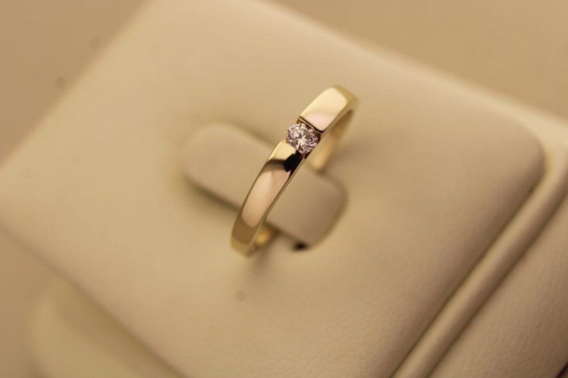 Prsteň- briliant- H/Si2- žlté zlato- 14 karátov