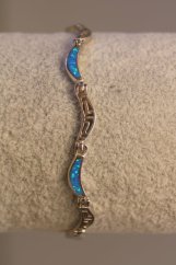 Strieborný polopevný náramok striedavý vzor s modrým opálom, rhodium, 19,5 cm, 10,27g, 925/1000