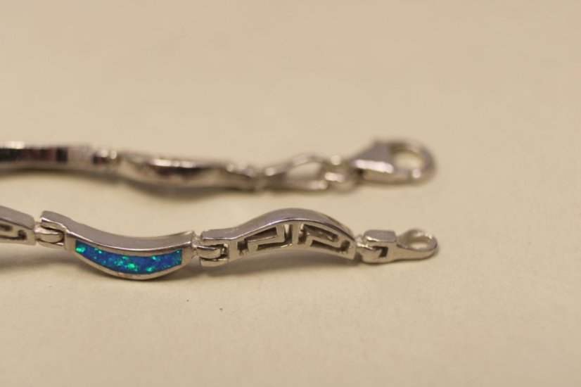 Strieborný polopevný náramok striedavý vzor s modrým opálom, rhodium, 19,5 cm, 10,27g, 925/1000