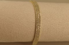 Náramok - tenisový - číre zirkóny - pozlátené striebro